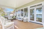 Step from the living room out to the veranda with plenty of outdoor furniture to relax
